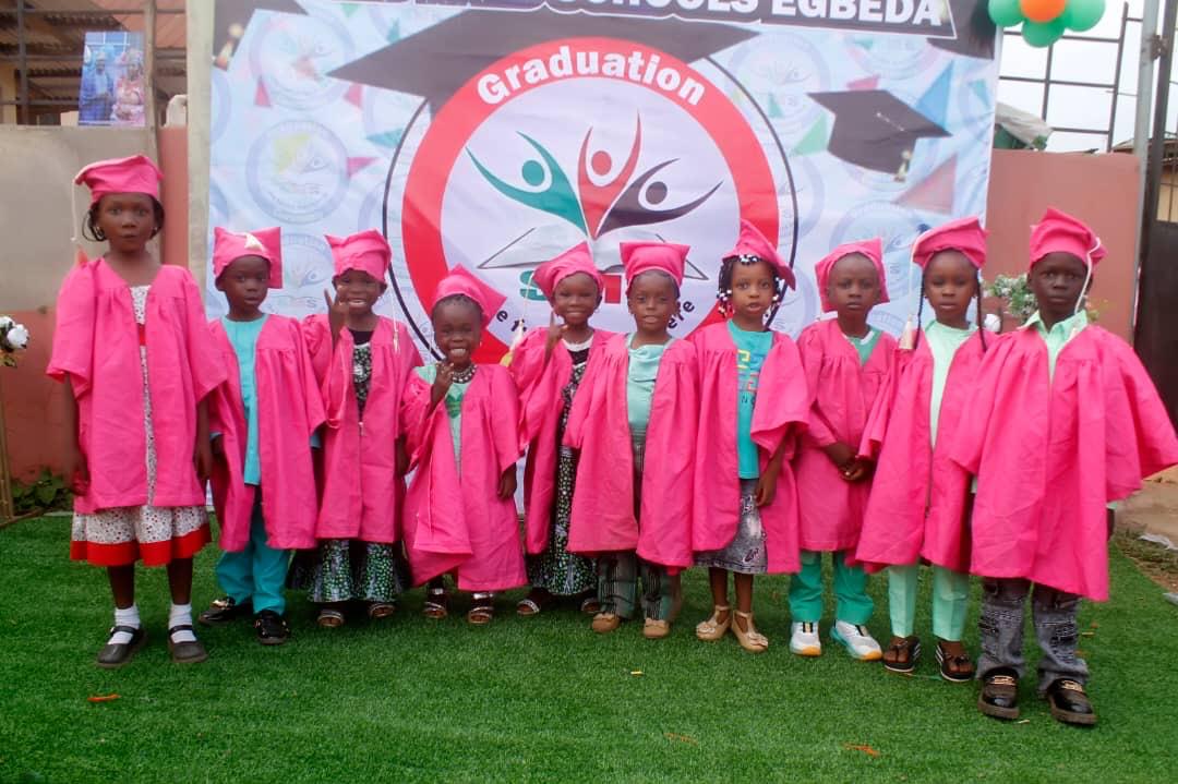 Nursery pupils in pink graduation gowns at the Sound Mind Schools Egbeda graduation